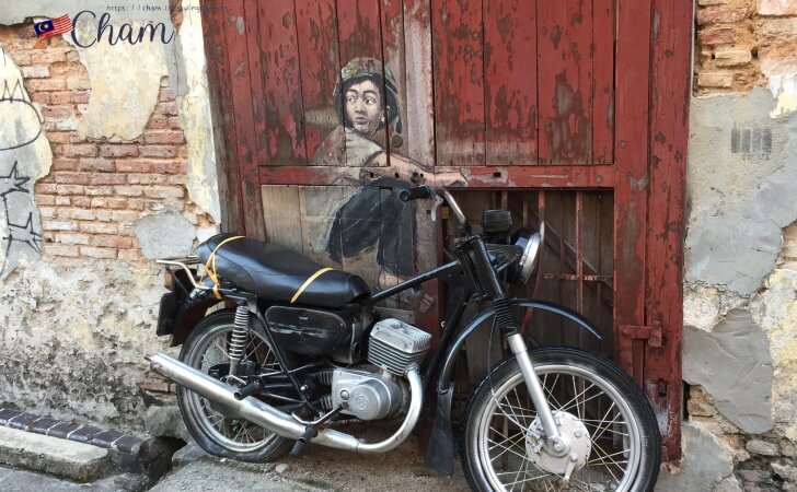 Ernest Zacharevicによるペナンストリートアート（boy on a bike）